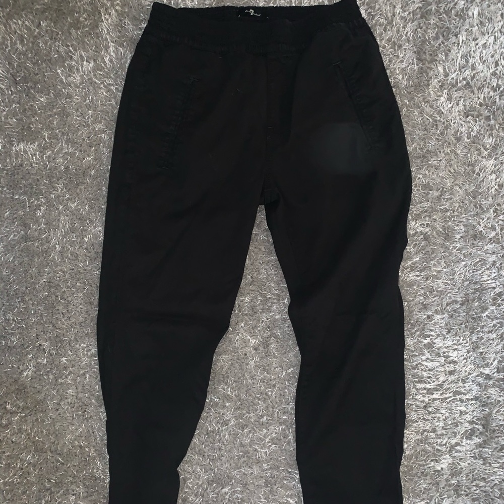 Dress up or down. Women’s black cropped joggers.
